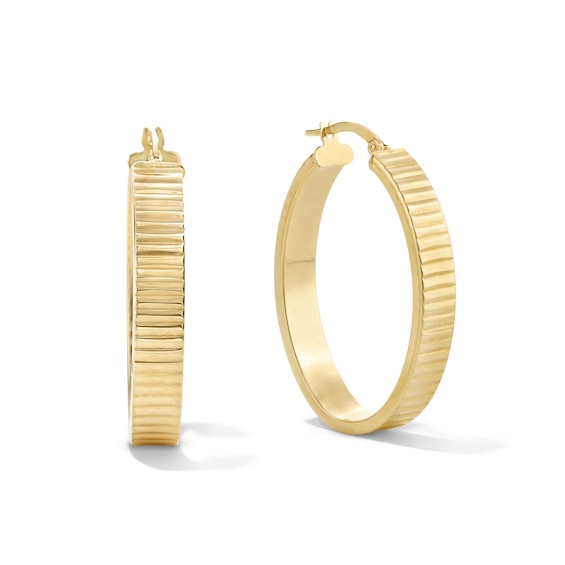 25.0mm Diamond-Cut Ribbed Oval Hoop Earrings in Hollow 10K Gold
