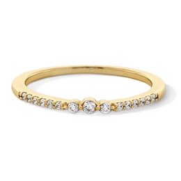 1/8 CT. T.W. Diamond Three Stone Stackable Band in 10K Gold