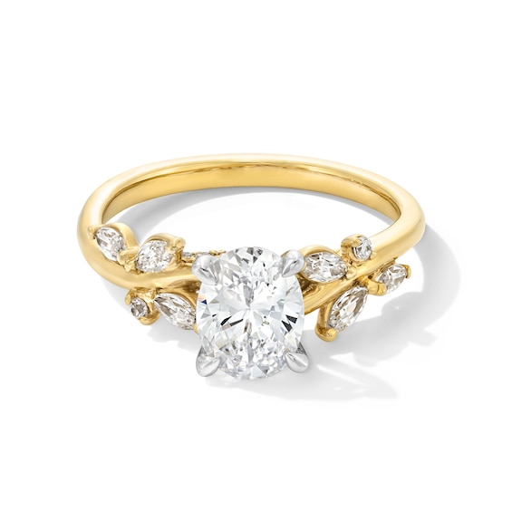 1-1/3 CT. T.w. Oval Certified Lab-Grown Diamond Leaf Shank Engagement Ring in 14K Gold (F/Vs2)