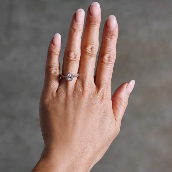 1 CT. T.w. Pear-Shaped Certified Lab-Grown Diamond Frame Crossover Shank Engagement Ring in 14K Rose Gold (F/Si2)