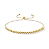 Thumbnail Image 1 of Diamond-Cut Bead Bolo Bracelet in Hollow 10K Gold - 9.0"