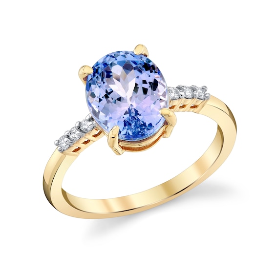 Oval Tanzanite and 1/15 CT. T.w. Diamond Ring in 10K Gold