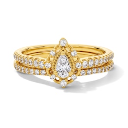 5/8 CT. T.W. Pear-Shaped Certified Lab-Grown Diamond Frame Vintage-Style Bridal Set in 14K Gold (F/VS2)