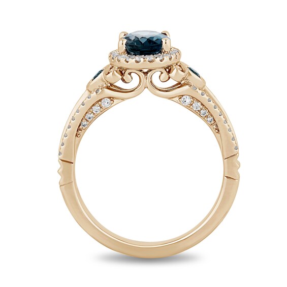 Enchanted Disney Cinderella Oval London Blue Topaz and 1/3 CT. T.w. Diamond Frame Engagement Ring in 14K Gold