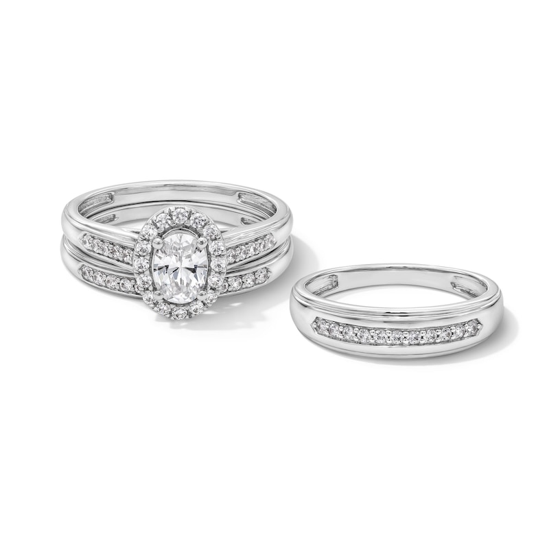 Main Image 1 of 1 CT. T.W. Oval Certified Lab-Grown Diamond Frame Wedding Ensemble in 10K White Gold (F/SI2)