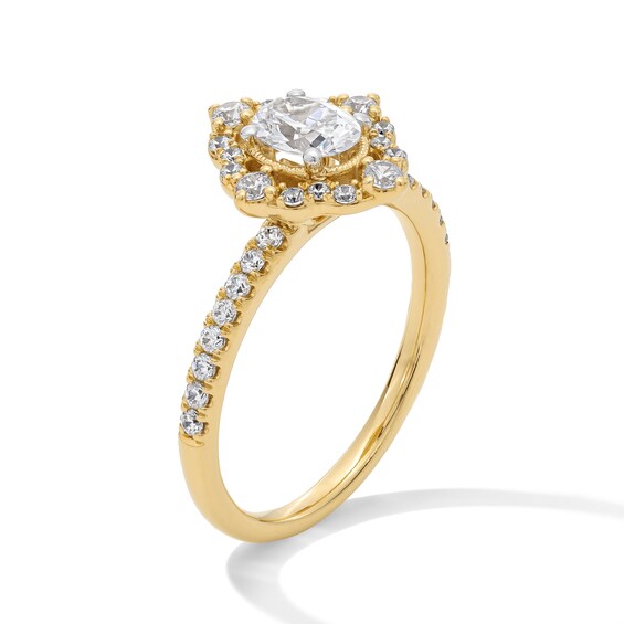 7/8 CT. T.w. Oval Diamond Frame Engagement Ring in 14K Gold