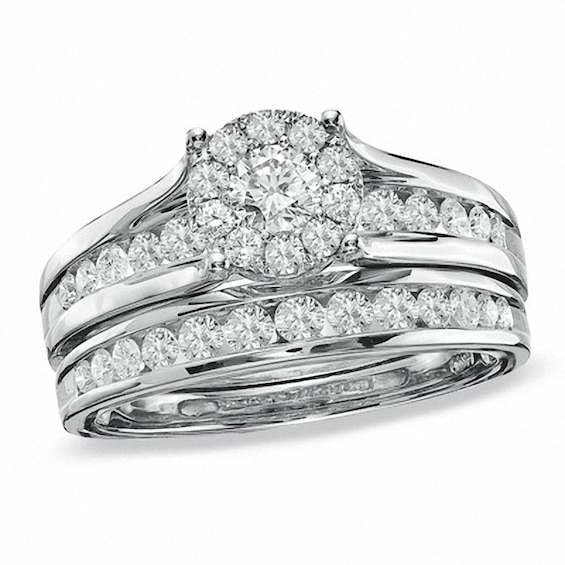 Previously Owned - 1 CT. T.w. Framed Diamond Soldered Bridal Set in 14K White Gold
