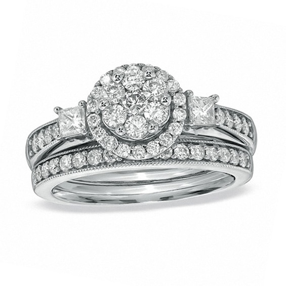Previously Owned - 1 CT. T.w. Round and Princess-Cut Diamond Flower Soldered Bridal Set in 10K White Gold