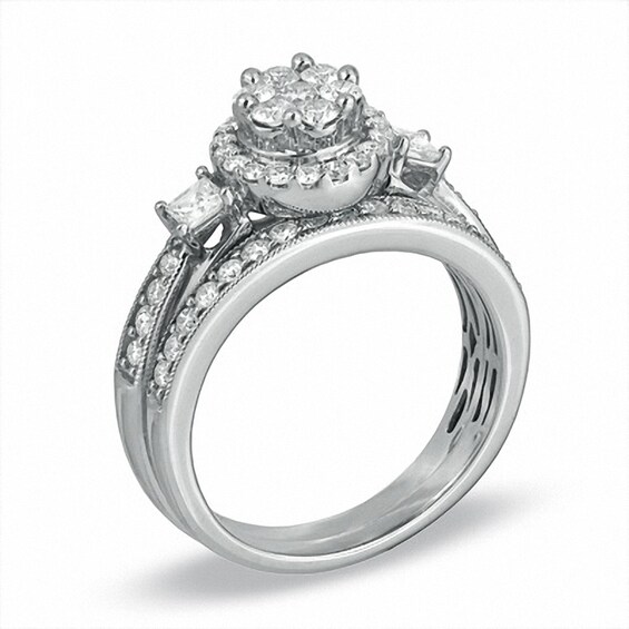 Previously Owned - 1 CT. T.w. Round and Princess-Cut Diamond Flower Soldered Bridal Set in 10K White Gold