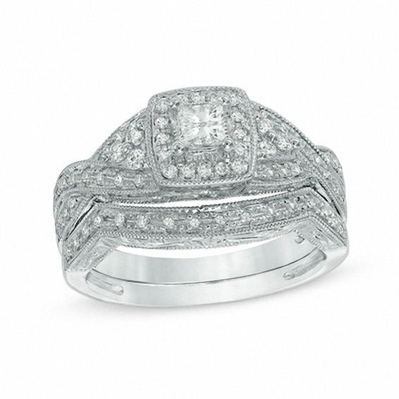 Previously Owned - 1/2 CT. T.w. Princess-Cut Diamond Twist Soldered Bridal Set in 14K White Gold