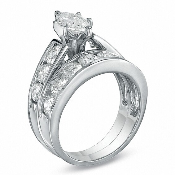 Previously Owned - 3 CT. T.w. Marquise Diamond Soldered Bridal Set in 14K White Gold with Diamond Accents