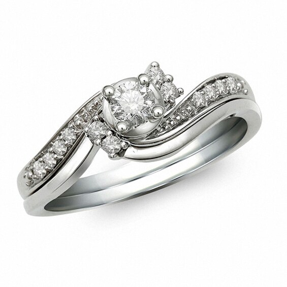 Previously Owned - 1/4 CT. T.w. Diamond Soldered Bridal Set in 10K White Gold