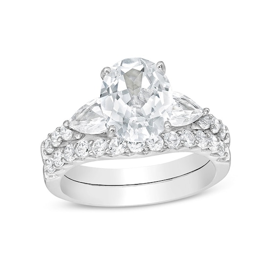 Previously Owned - Oval White Lab-Created Sapphire Leaf-Sides Soldered Bridal Set in Sterling Silver