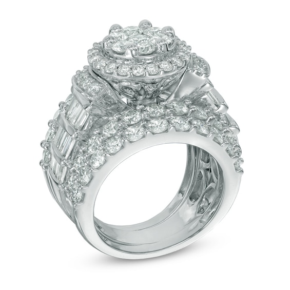 Previously Owned - 5 CT. T.w. Multi-Diamond Frame Three Piece Soldered Bridal Set in 14K White Gold