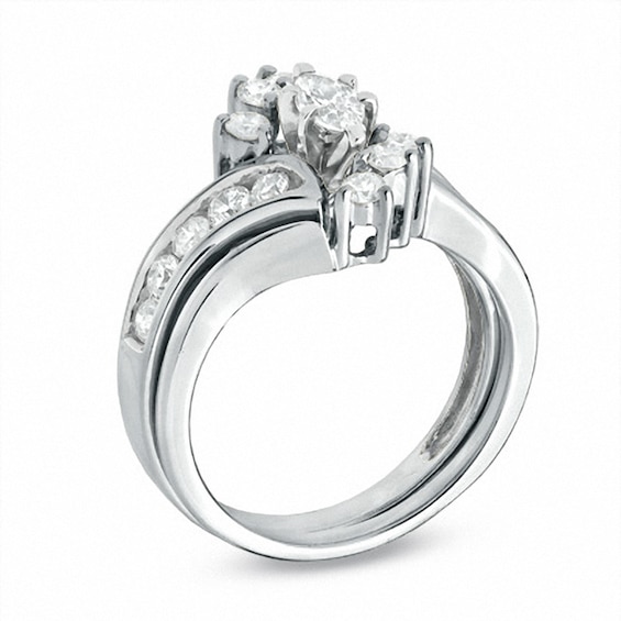 Previously Owned - 1 CT. T.w. Marquise Diamond Soldered Bridal Set in 14K White Gold
