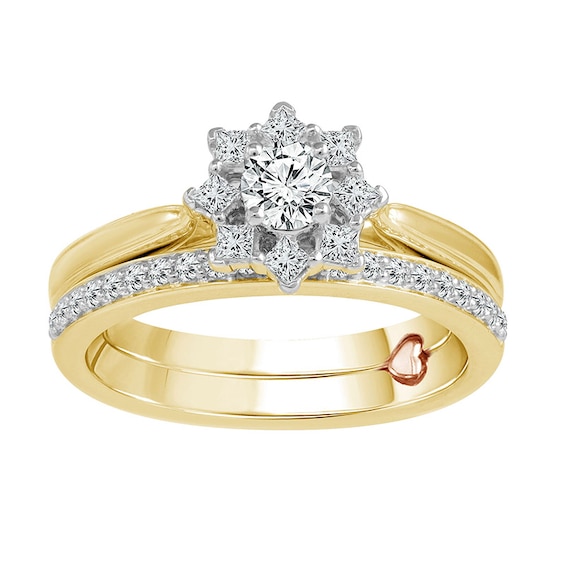 Previously Owned - 5/8 CT. T.w. Diamond Flower Soldered Bridal Set in 14K Two-Toned Gold