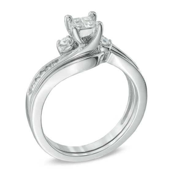 Previously Owned - 1/4 CT. T.w. Princess-Cut Quad Diamond Swirl Soldered Bridal Set in 10K White Gold