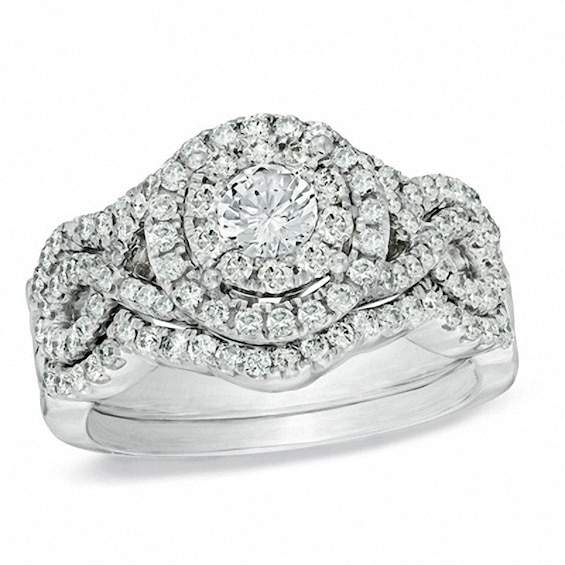 Previously Owned - 1-1/5 CT. T.w. Diamond Cluster Soldered Bridal Set in 14K White Gold