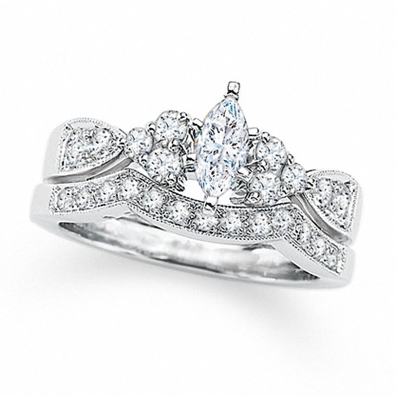 Previously Owned - 1-1/2 CT. T.w. Marquise Diamond Soldered Bridal Set in 14K White Gold