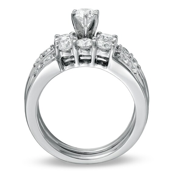 Previously Owned - 1-1/2 CT. T.w. Diamond Three Stone Soldered Bridal Set in 14K White Gold