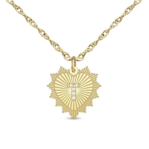 1/20 CT. T.w. Diamond Initial Heart Sunburst Frame Pendant (1 Initial)