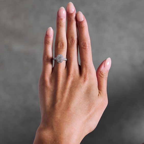 1/2 CT. T.w. Multi-Diamond Oval Frame Split Shank Engagement Ring in 10K White Gold