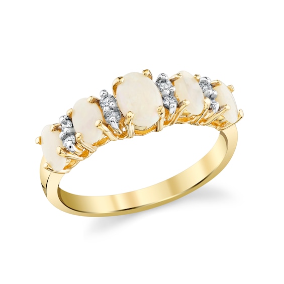 Oval Opal and 1/8 CT. T.w. Diamond Five-Stone Fashion Ring in 14K Yellow Gold