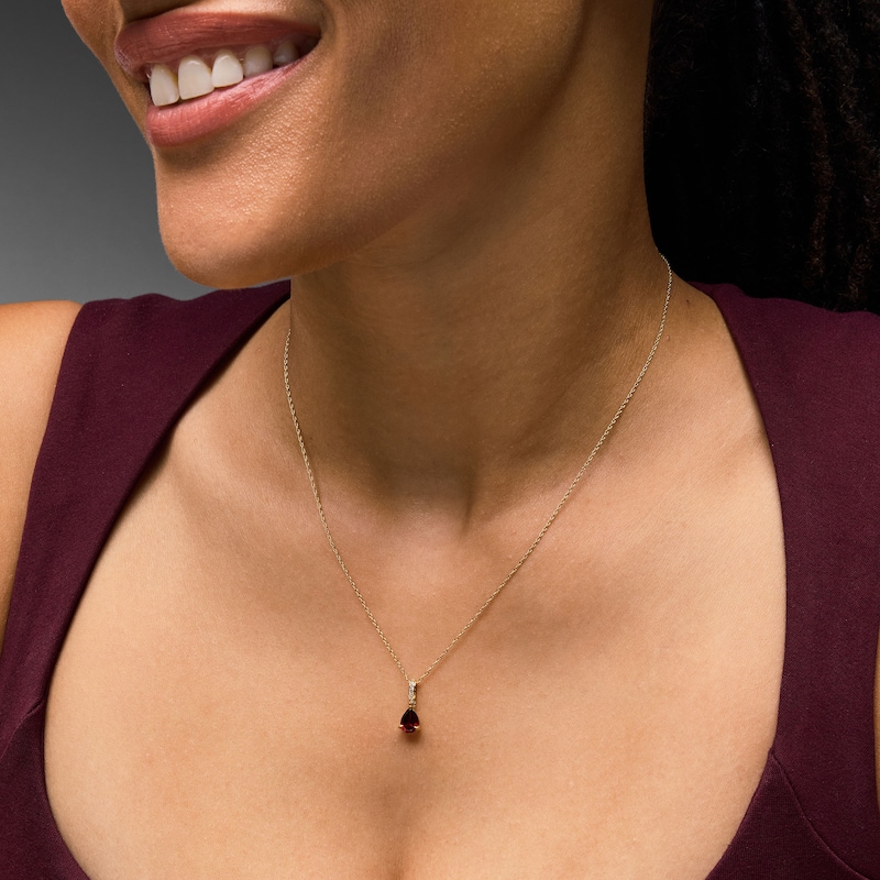 Main Image 2 of Pear-Shaped Garnet and Lab-Grown Diamond Accent Pendant in 10K Gold (F/VS2)