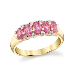 Oval Pink Sapphire and 1/20 CT. T.W. Diamond Fashion Ring in 10K Gold
