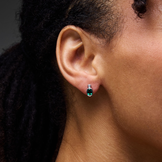 Oval Lab-Created Emerald and 1/20 CT. T.w. Lab-Grown Diamond Earrings in Sterling Silver (F/Vs2)
