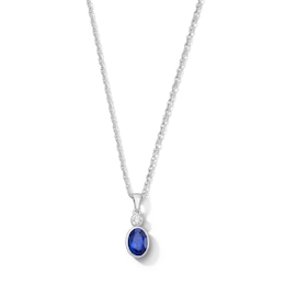 Oval Blue Lab-Created Sapphire and Lab-Grown Diamond Accent Pendant in Sterling Silver (F/VS2)