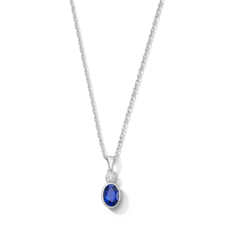 Main Image 1 of Oval Blue Lab-Created Sapphire and Lab-Grown Diamond Accent Pendant in Sterling Silver (F/VS2)