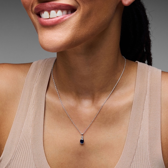 Oval Blue Lab-Created Sapphire and Lab-Grown Diamond Accent Pendant in Sterling Silver (F/Vs2)