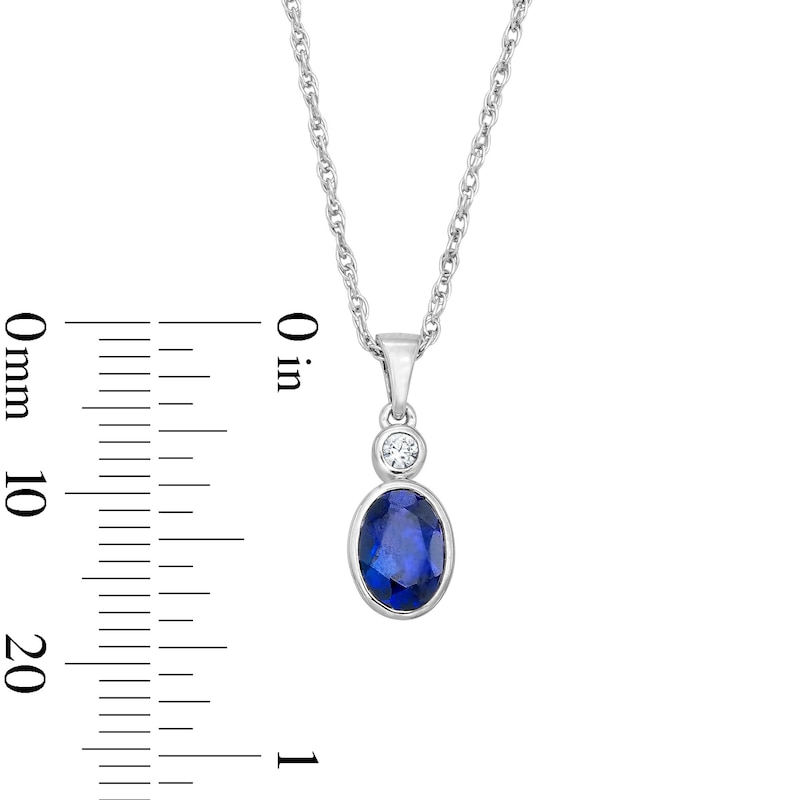 Main Image 2 of Oval Blue Lab-Created Sapphire and Lab-Grown Diamond Accent Pendant in Sterling Silver (F/VS2)