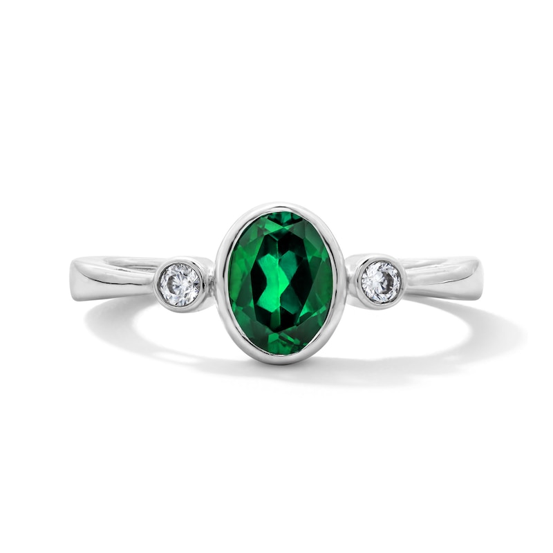 Main Image 1 of Oval Lab-Created Emerald and 1/15 CT. T.W. Lab-Grown Diamond Ring in Sterling Silver (F/VS2)