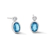 Thumbnail Image 1 of Oval Swiss Blue Topaz and 1/20 CT. T.W. Lab-Grown Diamond Earrings in Sterling Silver (F/VS2)