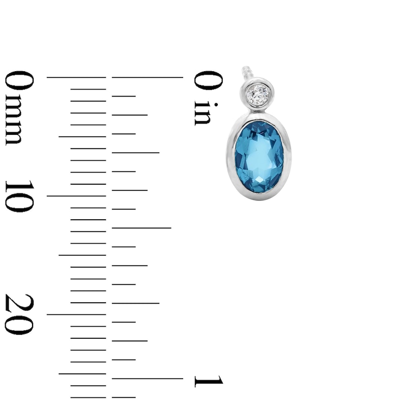 Main Image 3 of Oval Swiss Blue Topaz and 1/20 CT. T.W. Lab-Grown Diamond Earrings in Sterling Silver (F/VS2)