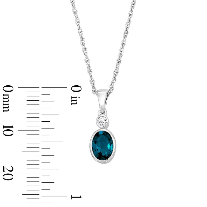 Main Image 2 of Oval Lab-Created Emerald and Lab-Grown Diamond Accent Pendant in Sterling Silver (F/VS2)