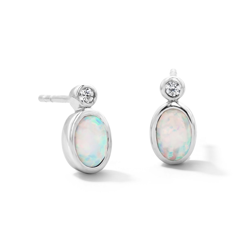 Main Image 1 of Oval Lab-Created Opal and 1/20 CT. T.W. Lab-Grown Diamond Earrings in Sterling Silver (F/VS2)