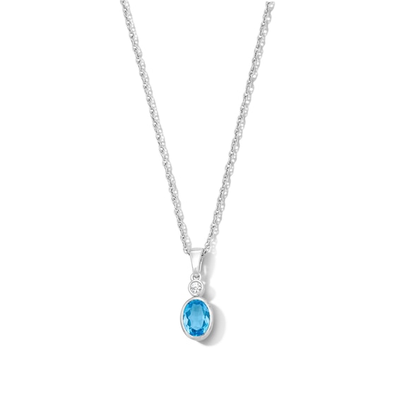 Oval Swiss Blue Topaz and Lab-Grown Diamond Accent Pendant in Sterling Silver (F/Vs2)