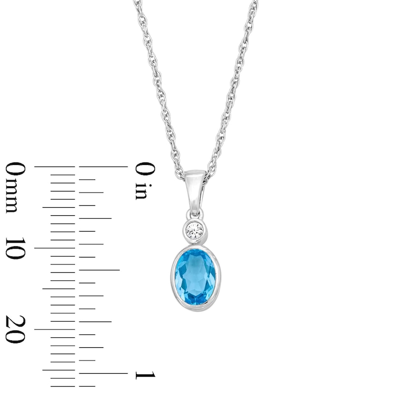 Main Image 3 of Oval Swiss Blue Topaz and Lab-Grown Diamond Accent Pendant in Sterling Silver (F/VS2)