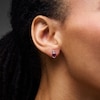 Thumbnail Image 2 of Oval Lab-Created Ruby and 1/20 CT. T.W. Lab-Grown Diamond Earrings in Sterling Silver (F/VS2)
