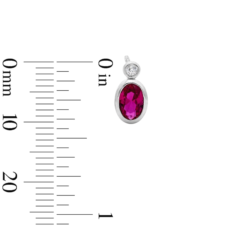 Main Image 2 of Oval Lab-Created Ruby and 1/20 CT. T.W. Lab-Grown Diamond Earrings in Sterling Silver (F/VS2)