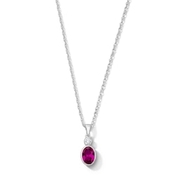Oval Lab-Created Ruby and Lab-Grown Diamond Accent Pendant in Sterling Silver (F/VS2)