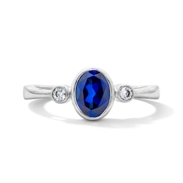 Oval Blue Lab-Created Sapphire and 1/15 CT. T.W. Lab-Grown Diamond Ring in Sterling Silver (F/VS2)