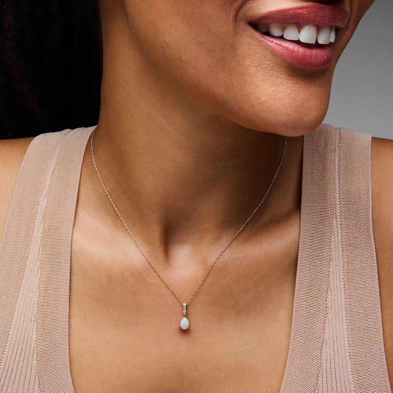 Main Image 2 of Pear-Shaped Opal and Lab-Grown Diamond Accent Pendant in 10K Gold (F/VS2)