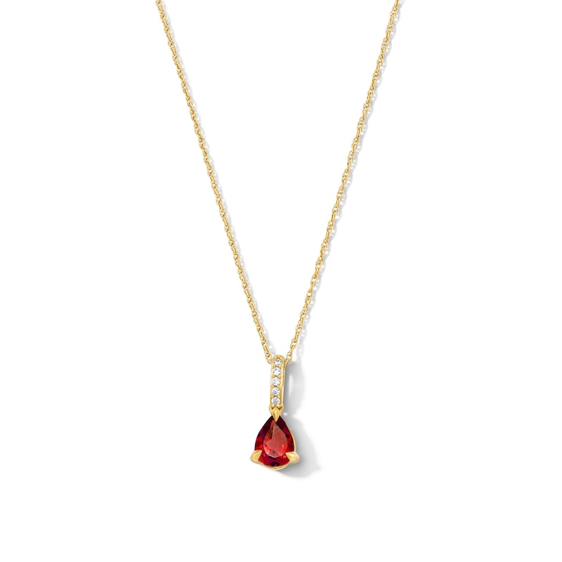 Main Image 1 of Pear-Shaped Ruby and Lab-Grown Diamond Accent Pendant in 10K Gold (F/VS2)