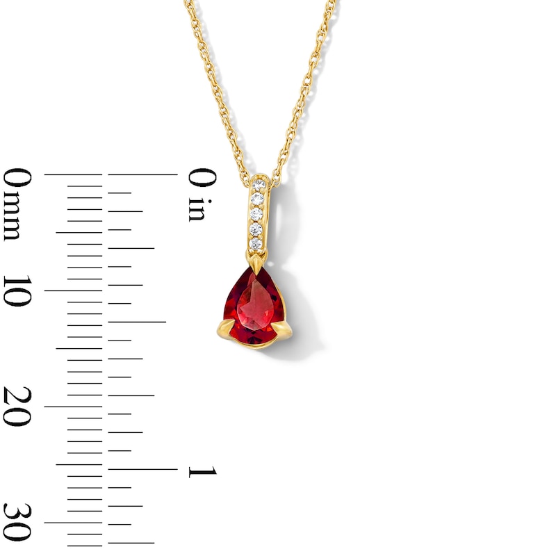Main Image 3 of Pear-Shaped Ruby and Lab-Grown Diamond Accent Pendant in 10K Gold (F/VS2)