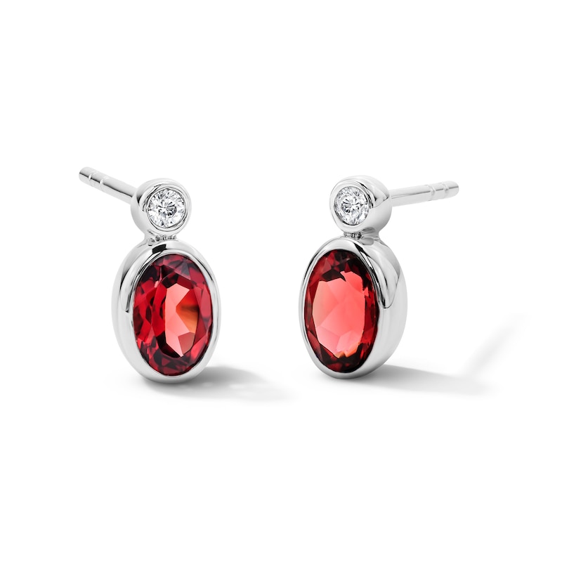 Main Image 1 of Oval Garnet and Lab-Grown Diamond Stud Earrings in Sterling Silver