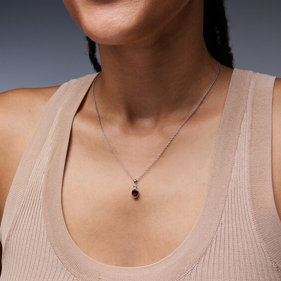 Oval Garnet and Lab-Grown Diamond-Accent Pendant in Sterling Silver